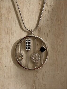 Touchstone Crystal Circle Pendant Necklace with Black and Clear Accents